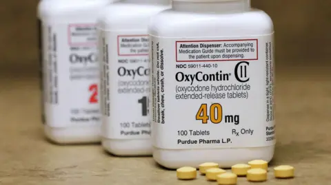 Reuters Bottles of the prescription painkiller OxyContin, manufactured by Purdue Pharma LP, sit on a counter at a local pharmacy in Provo, Utah, U.S., April 25, 2017.