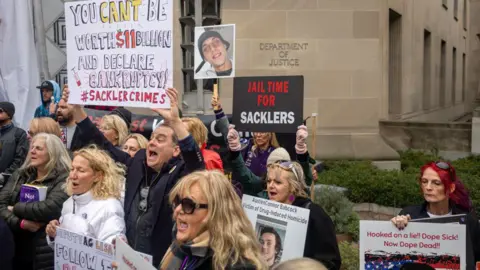 Getty Images People from across the United States who have lost loved ones to the opioid epidemic rallied at the Department of Justice in Washington, DC, calling on Attorney General Merrick Garland and Deputy AG Lisa Monaco to file charges criminal charges against members of the Sackler family. in 2021.